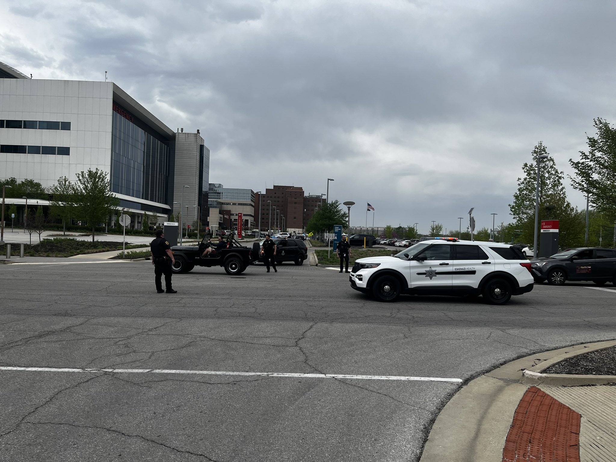 2 officers shot, driver dead, 1 in custody after police pursuit leads ...