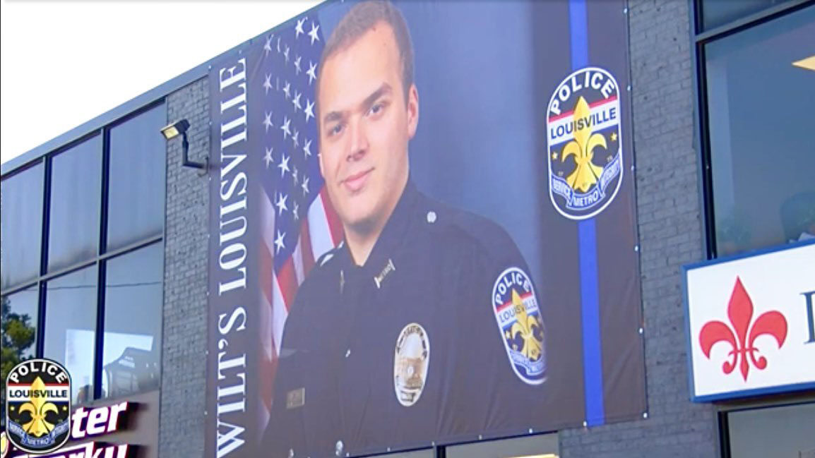 Banner honors police officer recovering after shooting at Louisville ...