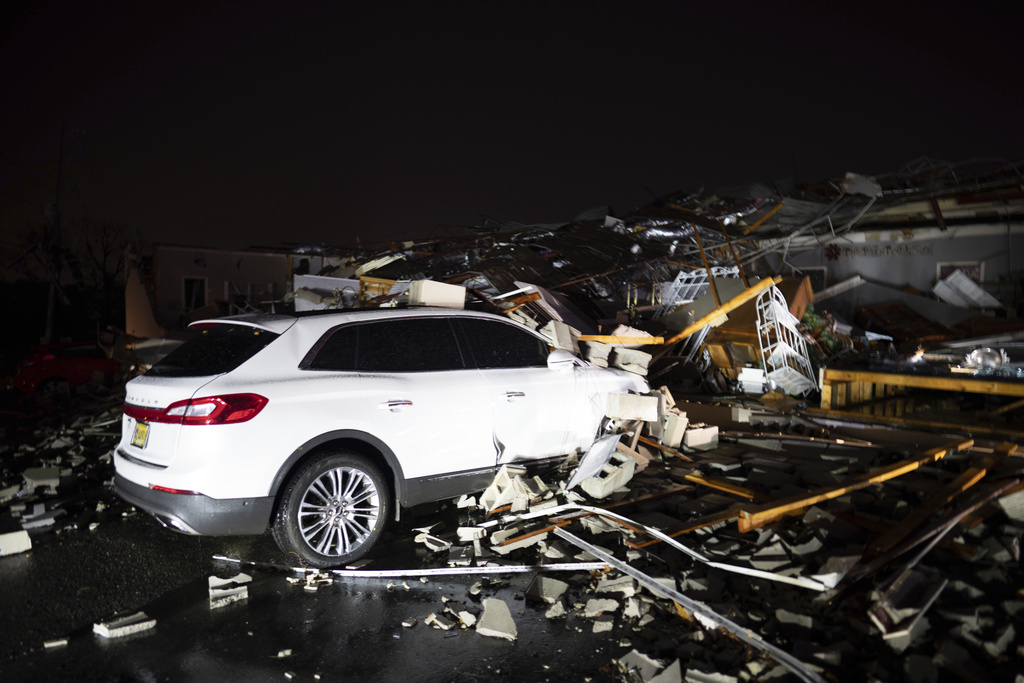 Crews search for survivors and survey damage after tornadoes leave at ...
