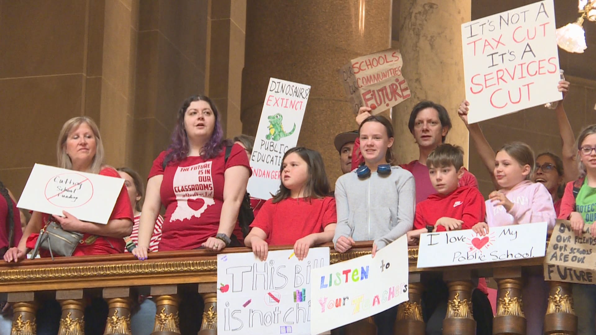 Thousands of teachers and families rally at Statehouse over property ...